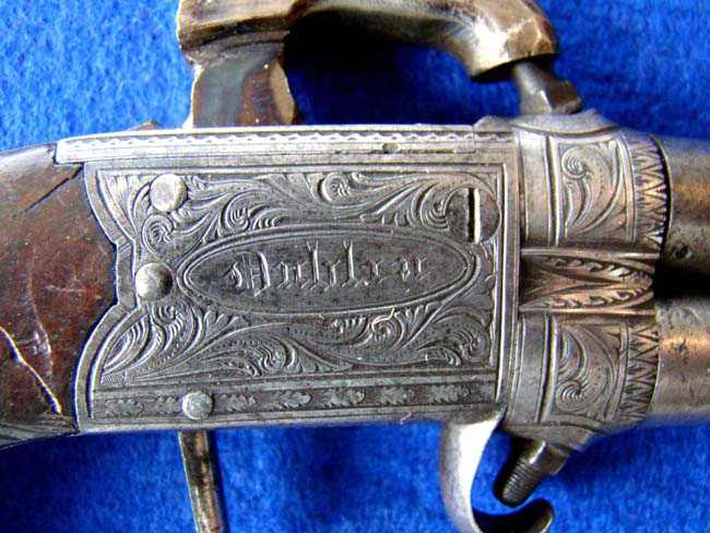 An Irish .38 cal. Percussion pocket pistol with swivel barrels made by Rigby of Dublin circa 1845 — image 3